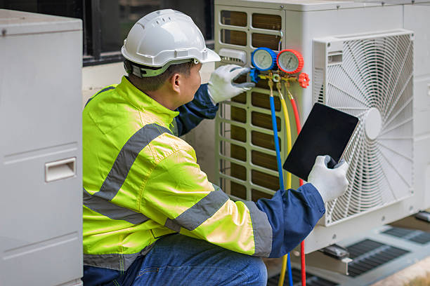 Professional Hvac technician working in Young America, IN